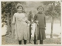 Image of Miriam Flowers and Susie with trout [Them Days says Miriam Brown & Maggie Brail]